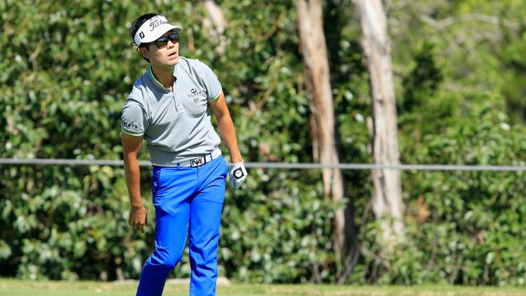 The game is up for Na after he pulled his drive into the hazard