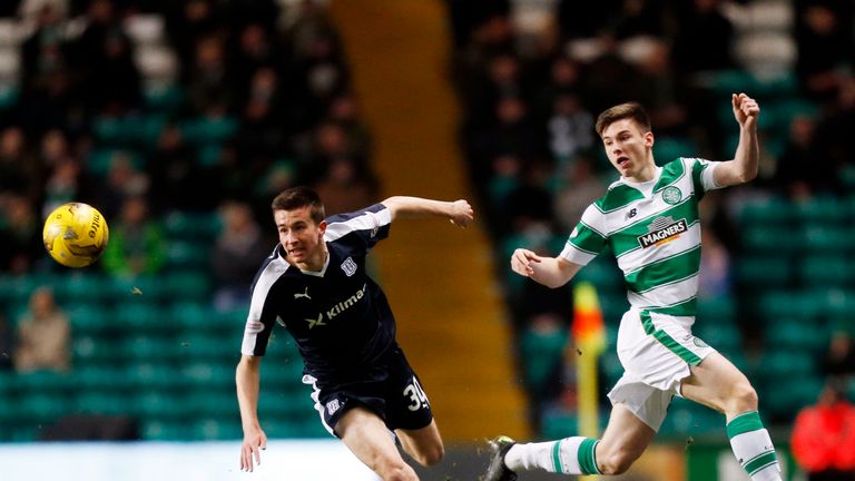 Dundee's Cammy Kerr and Celtic's Kieran Tierney (right) battle for the ball 