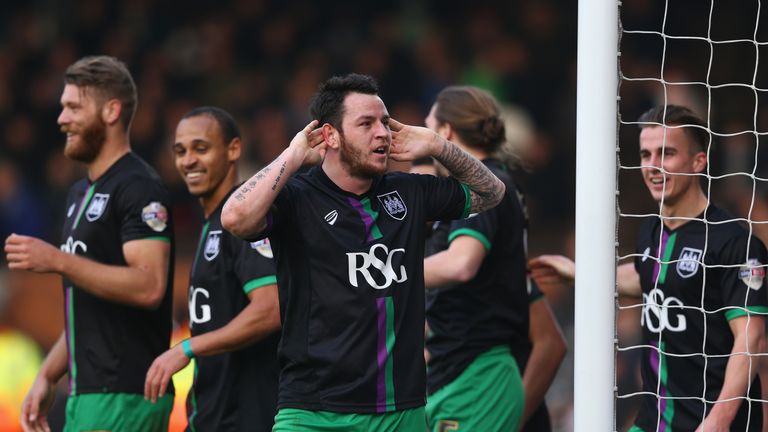 Lee Tomlin of Bristol City celebrates scoring the winning goal