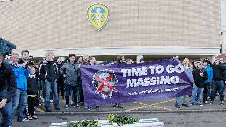 Leeds United fans protesting 'Time To Go Massimo' with coffin