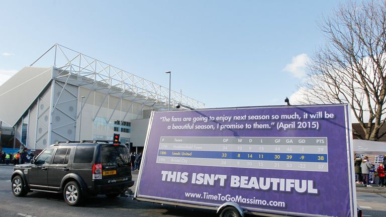 Protesting 'Time To Go Massimo' outside Elland Road