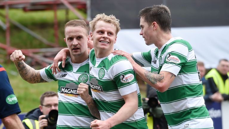 Celtic hitman Leigh Griffiths (left) celebrates his opening goal with Gary Mackay-steven (centre) and Mikael Lustig