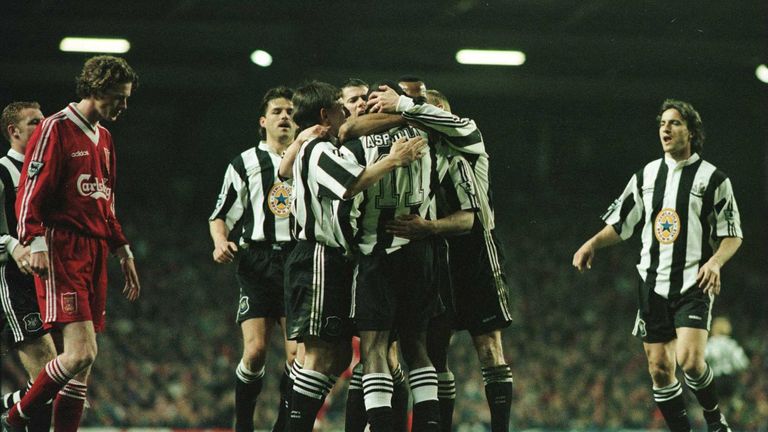 Newcastle players celebrate Les Ferdinand's equaliser at Anfield