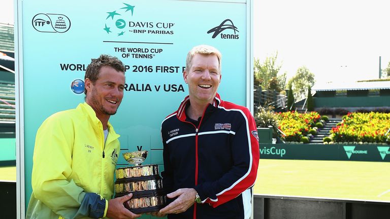 Llewton Hewitt captain of Australia and Jim Courier captain of the United States hold the Davis Cup