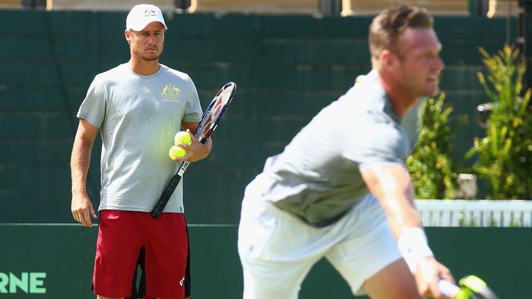 Llewton Hewitt captain of Australia looks on as Sam Groth of Australia plays a forehand during a Davis Cup practice session 