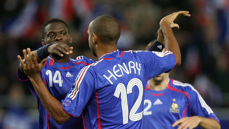 Louis Saha (14) and Thierry Henry celebrate a goal for France during qualifying for Euro 2008