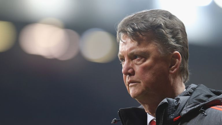 Manager Louis van Gaal walks off at half-time during the Europa League last-16 second leg match between Manchester United and Liverpool at Old Trafford