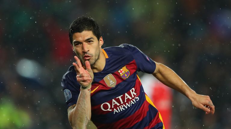 Luis Suarez celebrates scoring Barcelona's second goal against Arsenal