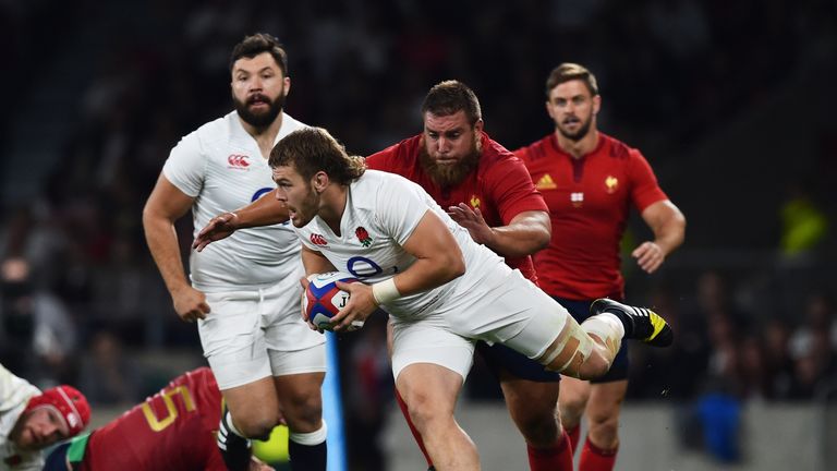 Luke Cowan-Dickie of England is tackled by Xavier Chiocci of France during the QBE International