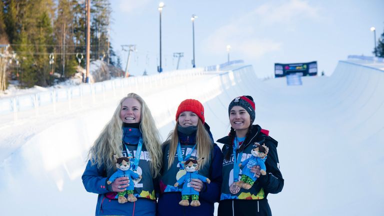 Madi Rowlands (c) won Team GB's first ever gold medal on snow