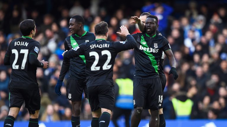 Mame Biram Diouf celebrates with his team-mates after equalising for Stoke