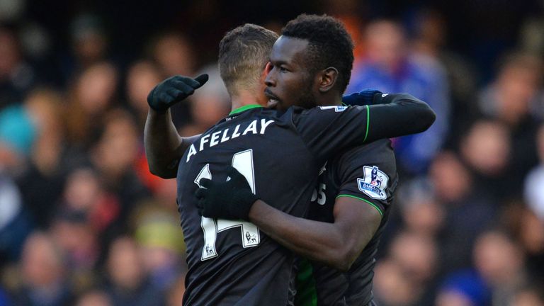 Mame Biram Diouf celebrates with Ibrahim Afellay 