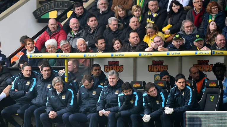 NORWICH, ENGLAND - MARCH 12: Manuel Pellegrini (3rd L), manager of Manchester City looks on during the Barclays Premier League match between Norwich City a