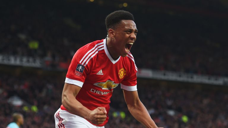 MANCHESTER, ENGLAND - MARCH 13:  Anthony Martial of Manchester United celebrates as he scores their first and equalising goal during the Emirates FA Cup si