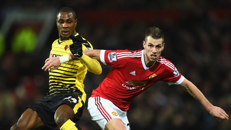 MANCHESTER, ENGLAND - MARCH 02:  Odion Ighalo of Watford challenges Morgan Schneiderlin of Manchester United during the Barclays Premier League match betwe