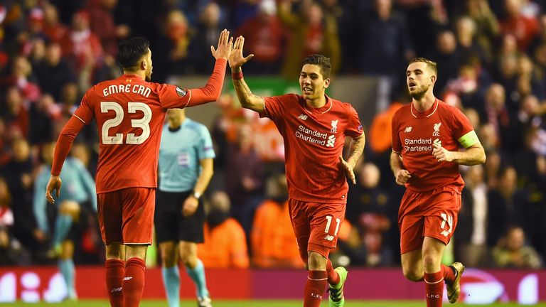 Roberto Firmino celebrates after scoring for Liverpool against Manchester United