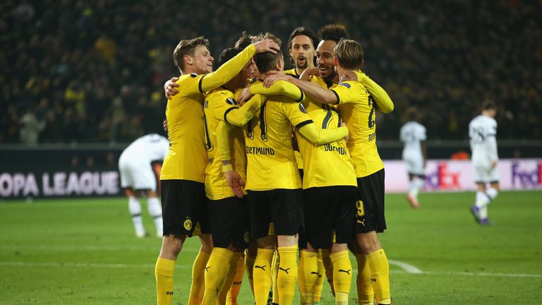Marco Reus is congratulated after scoring