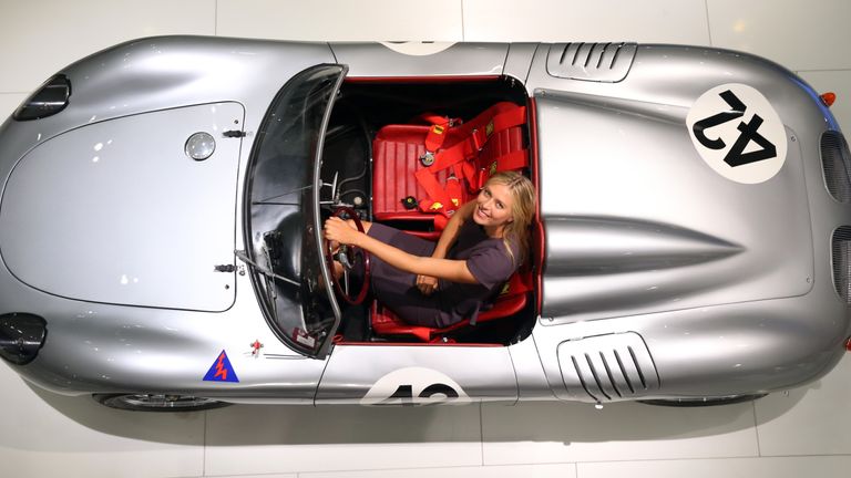 Maria Sharapova poses for the media as she is unveiled as car manufacturer Porsche's new brand ambassador