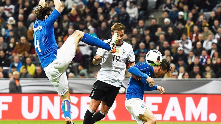 Mario Gotze (c) scores for Germany in the 4-1 win over Italy