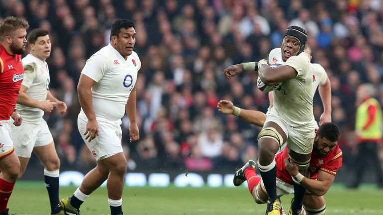 Maro Itoje is tackled by Taulupe Faletau