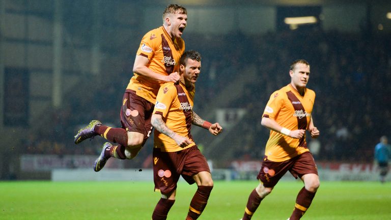 Motherwell's Marvin Johnson (centre) celebrates after scoring the equaliser 