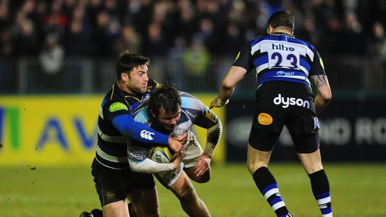 Newcastle's George McGuigan is tackled by Matt Banahan of Bath