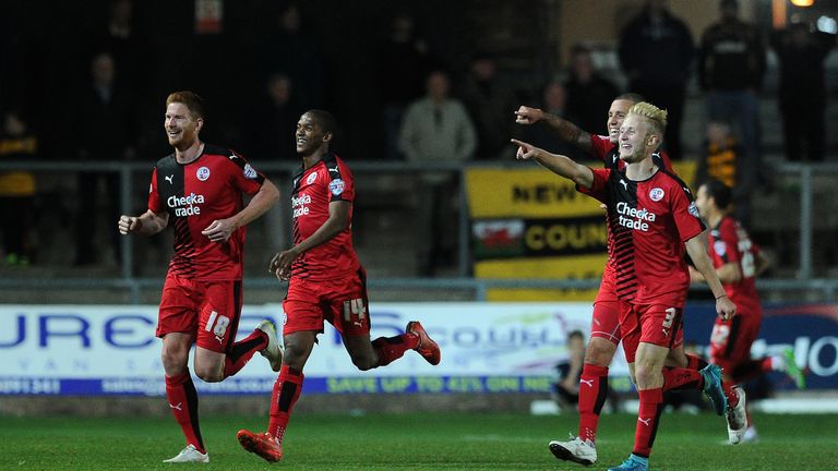 NEWPORT, WALES - SEPTEMBER 29: Matt Harrold of Crawley Town (far left) celebrates his side's third goal during the Sky Bet League Two match between Newport