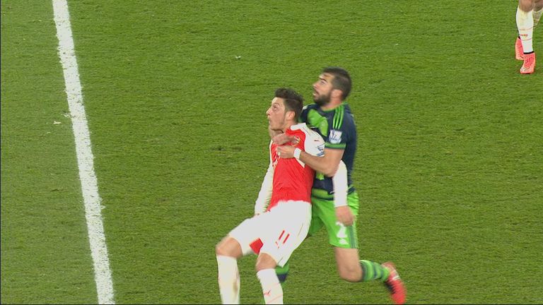 Mesut Ozil and Jordi Amat: Should the referee have blown for a foul on Ozil?