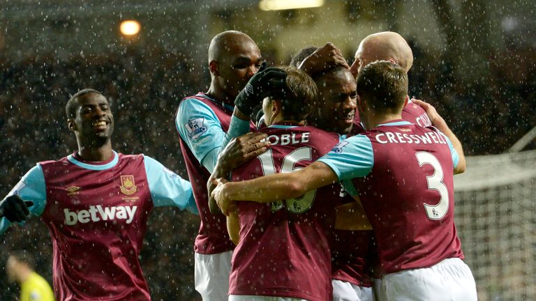 Michail Antonio celebrates with team-mates after scoring West Ham's opening goal against Tottenham