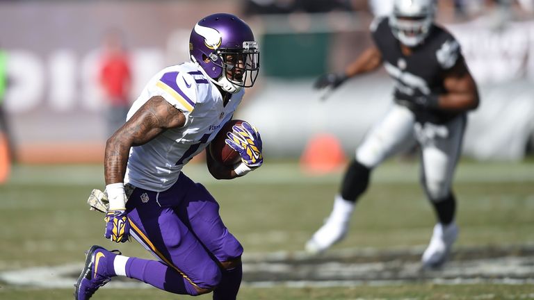 Wide receiver Mike Wallace #11 of the Minnesota Vikings rushes against the Oakland Raiders in the first quarter at O.co Coliseu