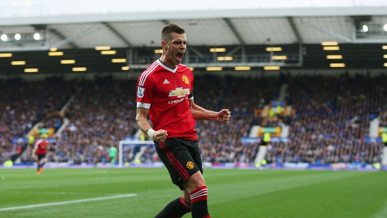 LIVERPOOL, ENGLAND - OCTOBER 17:  Morgan Schneiderlin of Manchester United celebrates scoring his team's first goal during the Barclays Premier League matc