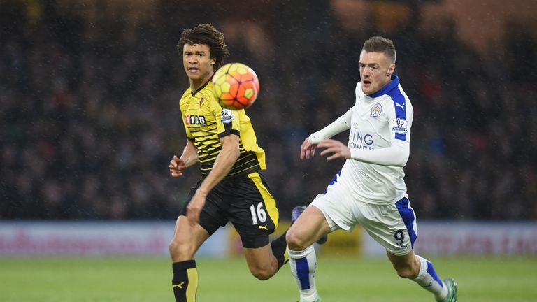 Jamie Vardy and Nathan Ake compete for the ball