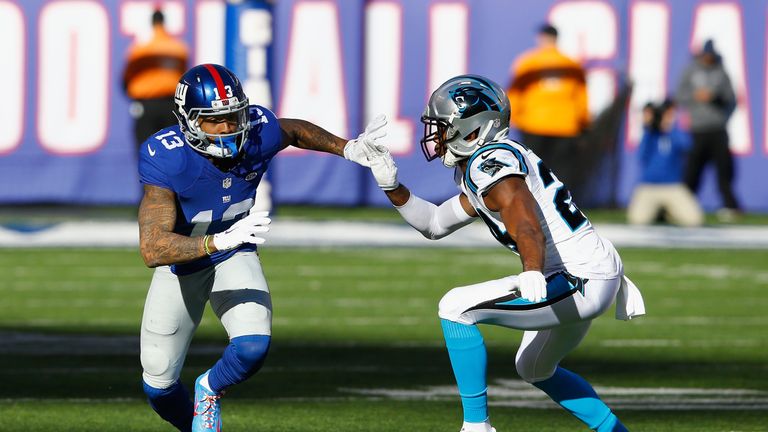 Odell Beckham #13 of the New York Giants in action against Josh Norman #24 of the Carolina Panthers during their game a