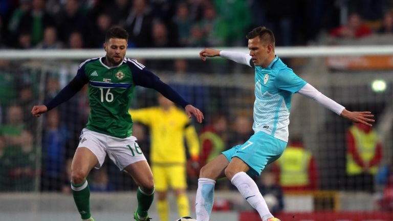 Northern Ireland's Oliver Norwood (left) and Slovenia's Ilicic Josip battle for the ball during an International Friendly at Windsor Park, Belfast
