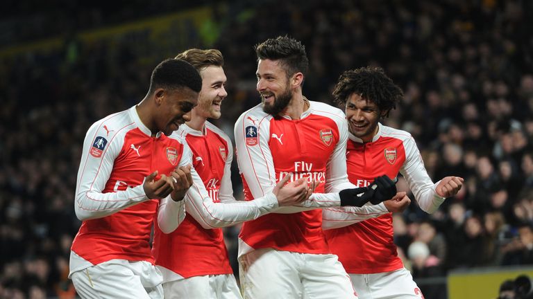 Olivier Giroud celebrates scoring a goal for Arsenal with Alex Iwobi, Calum Chambers and Mohamed Elneny 
