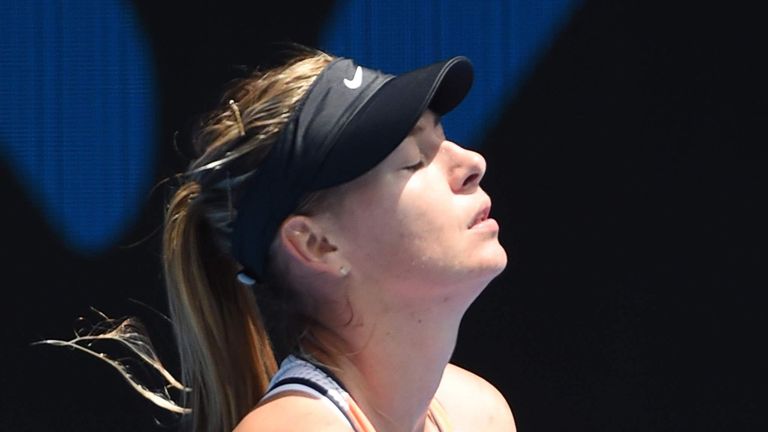 Russia's Maria Sharapova reacts during her women's singles match against Serena Williams of the US on day nine of the 2016 Australian Open tennis tournament