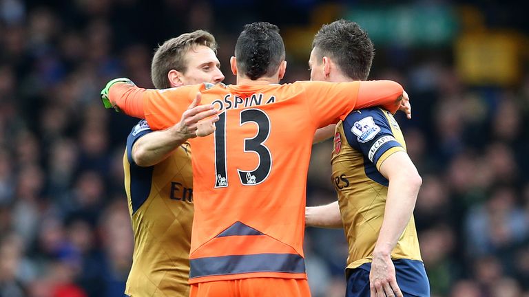 Nacho Monreal, David Ospina and Laurent Koscielny (left to right) celebrate Arsenal's second goal against Everton