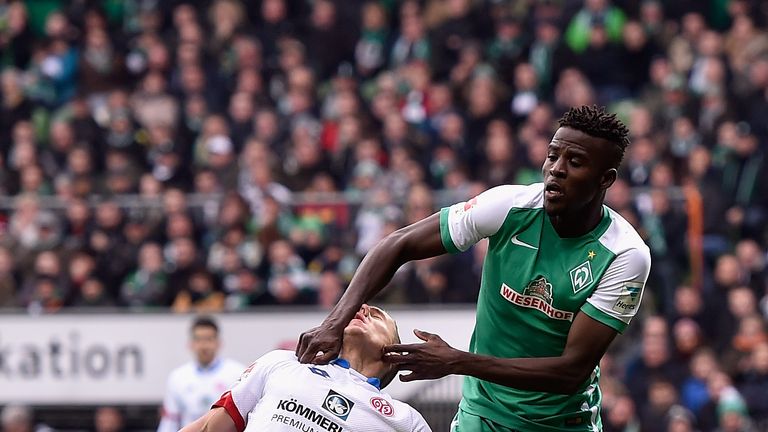 Pablo De Blasis of 1. FSV Mainz 05 is pushed down by Papy Djilobodji 