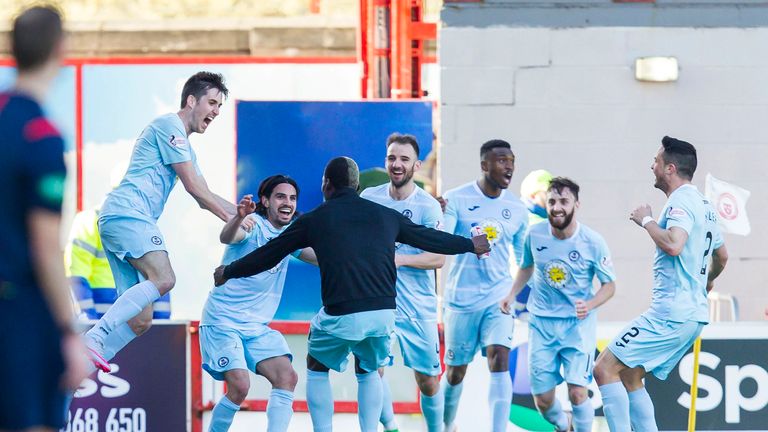 Partick Thistle players celebrate with Ryan Edwards (second from left) after he scored the winner against Hamilton