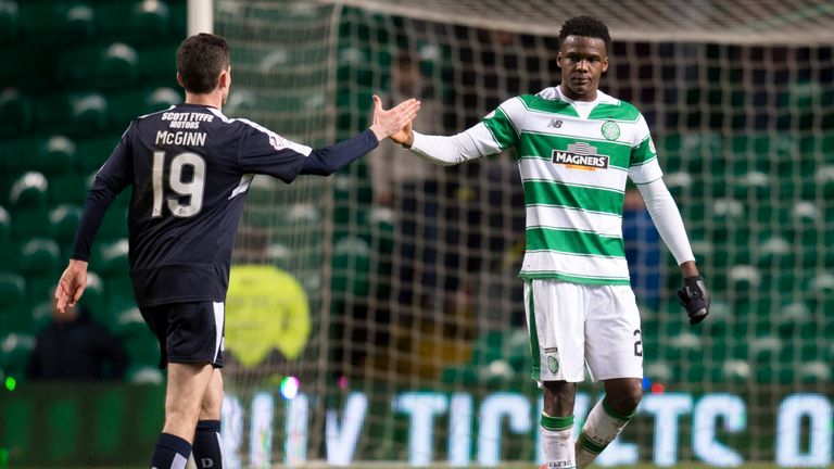 Celtic's Dedryck Boyata (right) with Paul McGinn at full-time