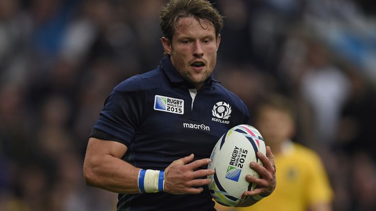Scotland's centre Peter Horne runs with the ball  during a 