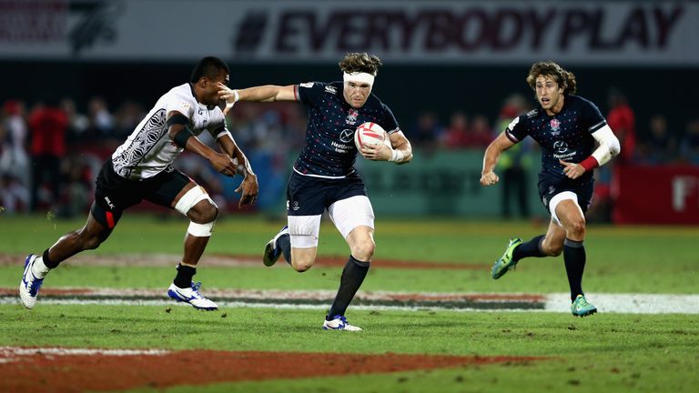 Phil Burgess of England in action against Fiji in the Cup Final during the Emirates Dubai Rugby Sevens 