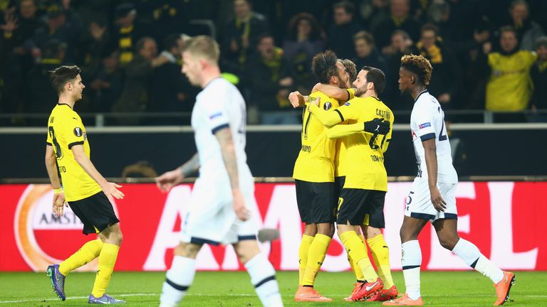 Pierre-Emerick Aubameyang of Borussia Dortmund (4R) celebrates as he scores during the UEFA Europa League Round of 16 first leg v Tottenham