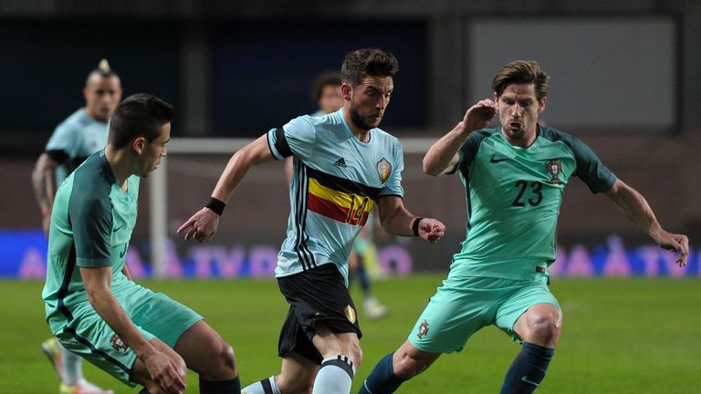 Belgium's midfielder Dries Mertens (C) vies with Portugal's midfielder Adrien Silva (R) during the friendly football match between Portugal an