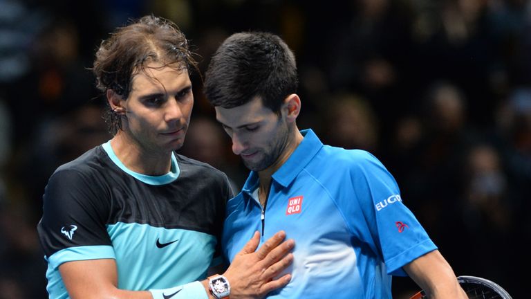 Serbia's Novak Djokovic (R) greets Spain's Rafael Nadal 