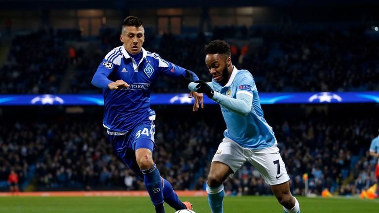 Manchester City's Raheem Sterling and Dynamo Kiev's Yevhen Khacheridi battle for the ball