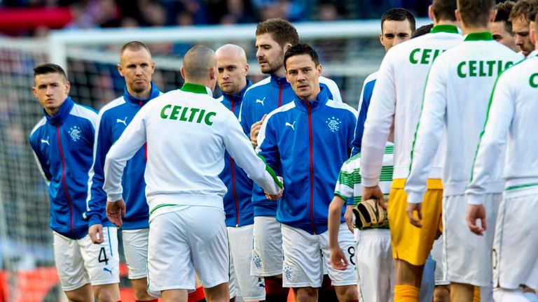 Rangers and Celtic players shake hands ahead of the Scottish League Cup semi-final in 2015