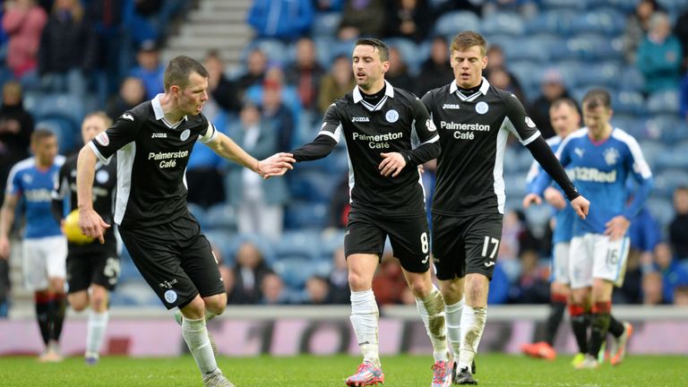 Queen of the South's Mark Millar (middle) celebrates his 90th-minute goal against Rangers