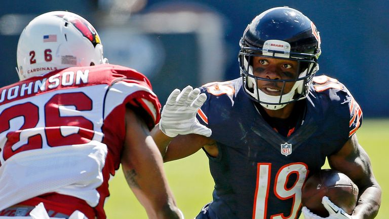 Eddie Royal #19 of the Chicago Bears runs against Rashad Johnson #26 of the Arizona Cardinals during the first half at Soldier 