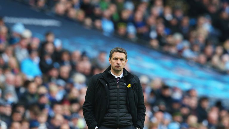 Aston Villa manager Remi Garde  looks on during the Premier League match with Manchester City at Etihad Stadium